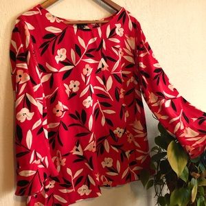 Women’s XL pink long sleeves flowered top.